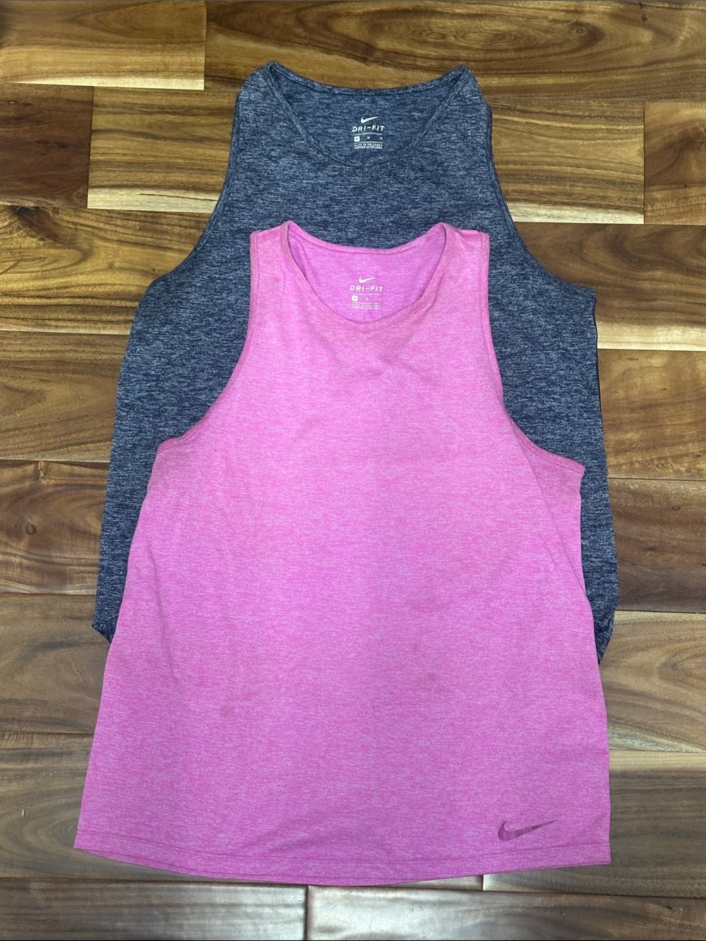 Bundle of two Nike Women’s Performance Tank Tops. Pink and Navy. Size M